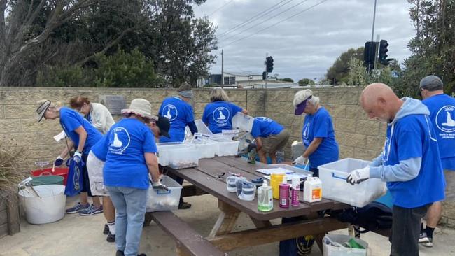 Volunteers for Safety Beach/Dromana Beach Patrol pick up and sort rubbish. Picture: supplied