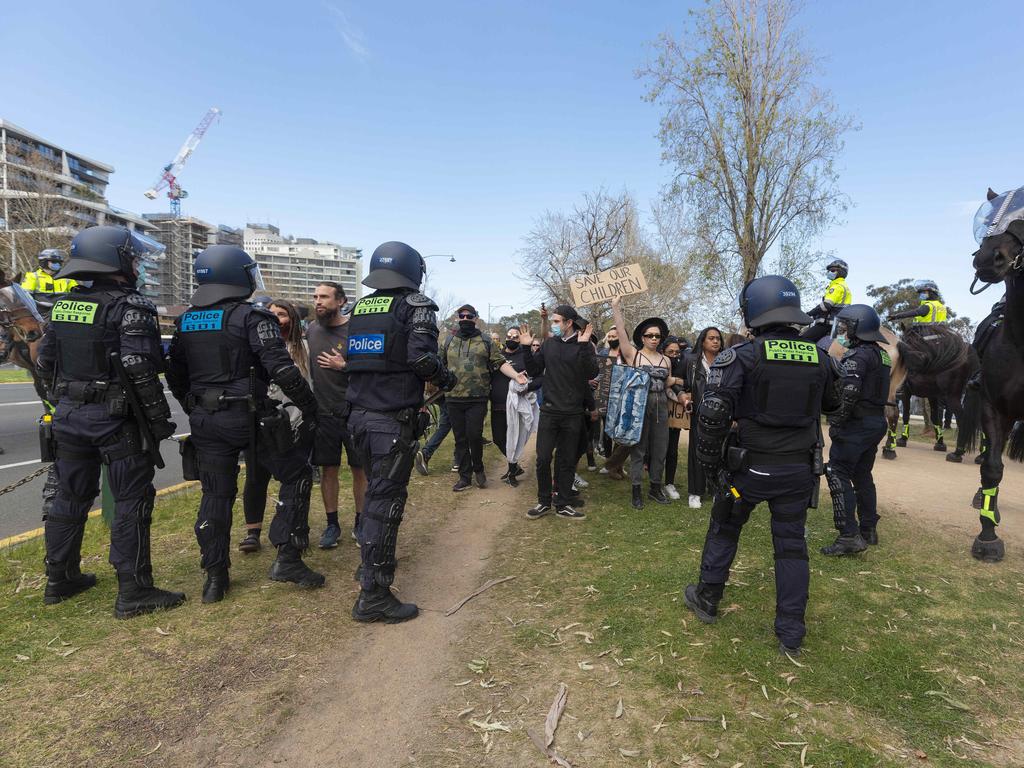 Police contain protesters at Albert Park Lake in Melbourne last weekend. Picture: NCA NewsWire / Daniel Pockett