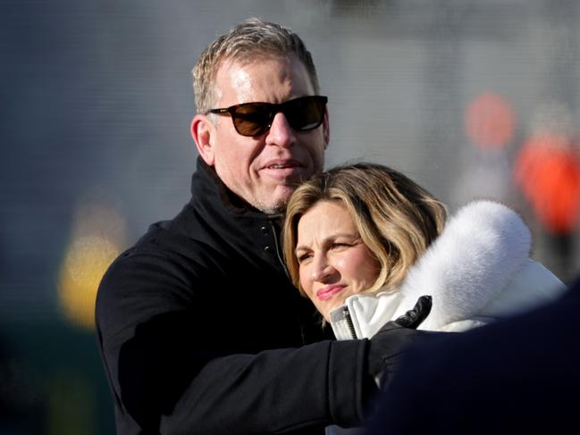 GREEN BAY, WISCONSIN - DECEMBER 25: Troy Aikman and Erin Andrews meet before the game between the Cleveland Browns and the Green Bay Packers at Lambeau Field on December 25, 2021 in Green Bay, Wisconsin. (Photo by Stacy Revere/Getty Images)