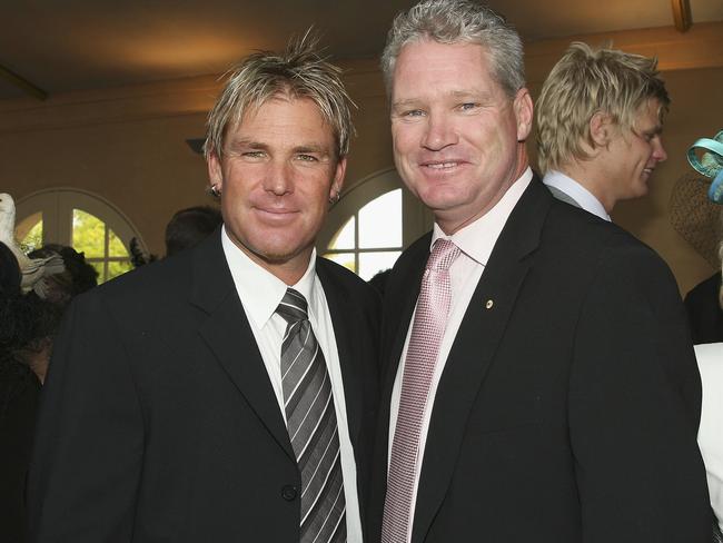 Shane Warne with Dean Jones at Flemington racecourse in 2006.