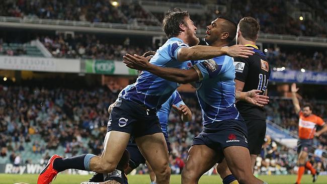 Waratahs winger Rob Horne celebrates his try with Kurtley Beale.