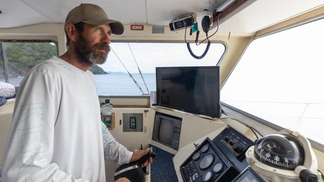 Chris Bolton at the helm of his commercial fishing vessel. Picture: Supplied