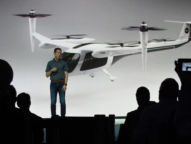 Jeff Holden, Uber chief product officer, speaks at the second annual Uber Elevate Summit in May 8, on the electric “flying taxi” vertical takeoff and landing concept aircraft, which showcases prototypes for UberAir's fleet of airborne taxis. Picture: AFP / Robyn Beck