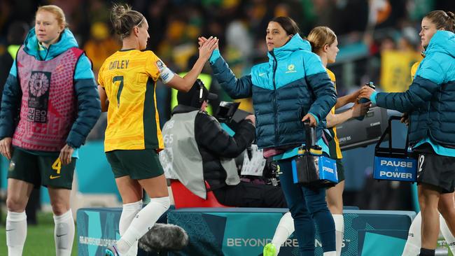 Kerr high fives with stand-in skipper Steph Catley. Picture: Cameron Spencer/Getty Images