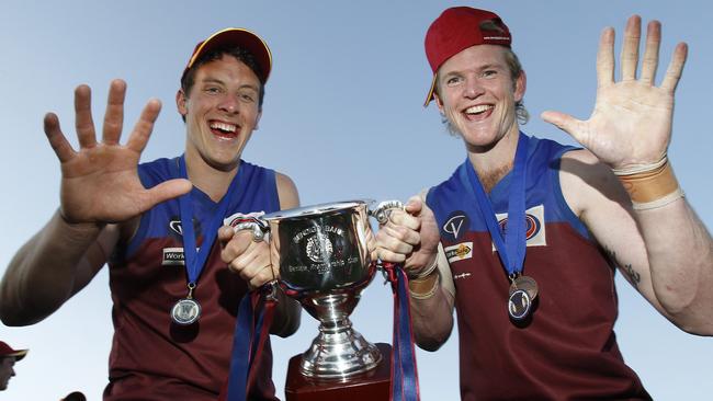 Horsham co-captains Jeremy Hartigan and Nic Pekin after the Demons made it 10 premierships in a row.