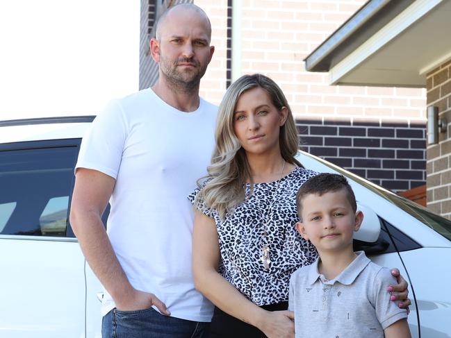 Mark and Betty Mastrippolito with their son Luke, 7, are concerned about development making commutes even longer from their home in The Ponds. Picture: David Swift