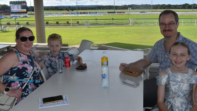 Hudson Wheeler (back left), Caroline Wheeler (front left), Hank Wheeler (back right) and Molly Wheeler (front right) at the Sunshine Coast Races on April 7, 2024.