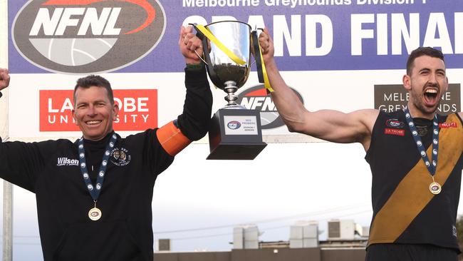 Danny Nolan and captain Sam Gilmore celebrate the 2022 premiership.Photo: Hamish Blair