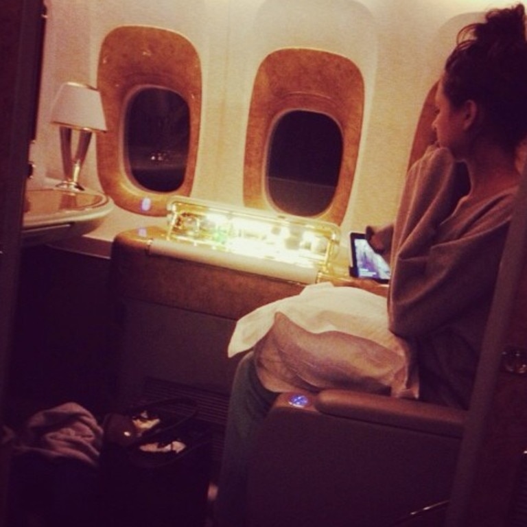 Anna had only scored a first class seat for 20 minutes after her brother threw up on her in economy. Picture: Instagram.