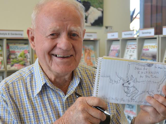 JOKESTER: Cartoonist Tony Turton loves to make people laugh with his cartoons. Photo Rhiannon Tuffield / South Burnett Times
