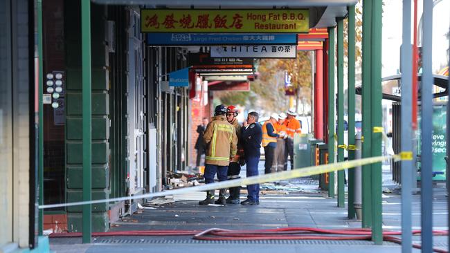 Firefighters outside Chinatown on Grote St. Picture: Tait Schmaal