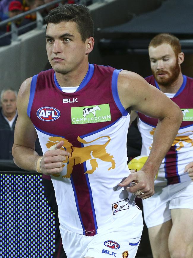 Tom Rockliff leads the Lions out. Picture: Sarah Reed