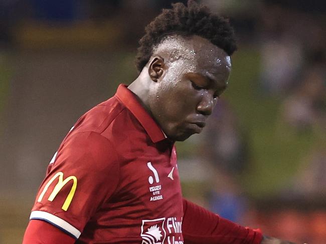 NEWCASTLE, AUSTRALIA - MARCH 11: Nestory Irankunda of Adelaide United with the ball during the round 20 A-League Men's match between Newcastle Jets and Adelaide United at McDonald Jones Stadium, on March 11, 2023, in Newcastle, Australia. (Photo by Scott Gardiner/Getty Images)