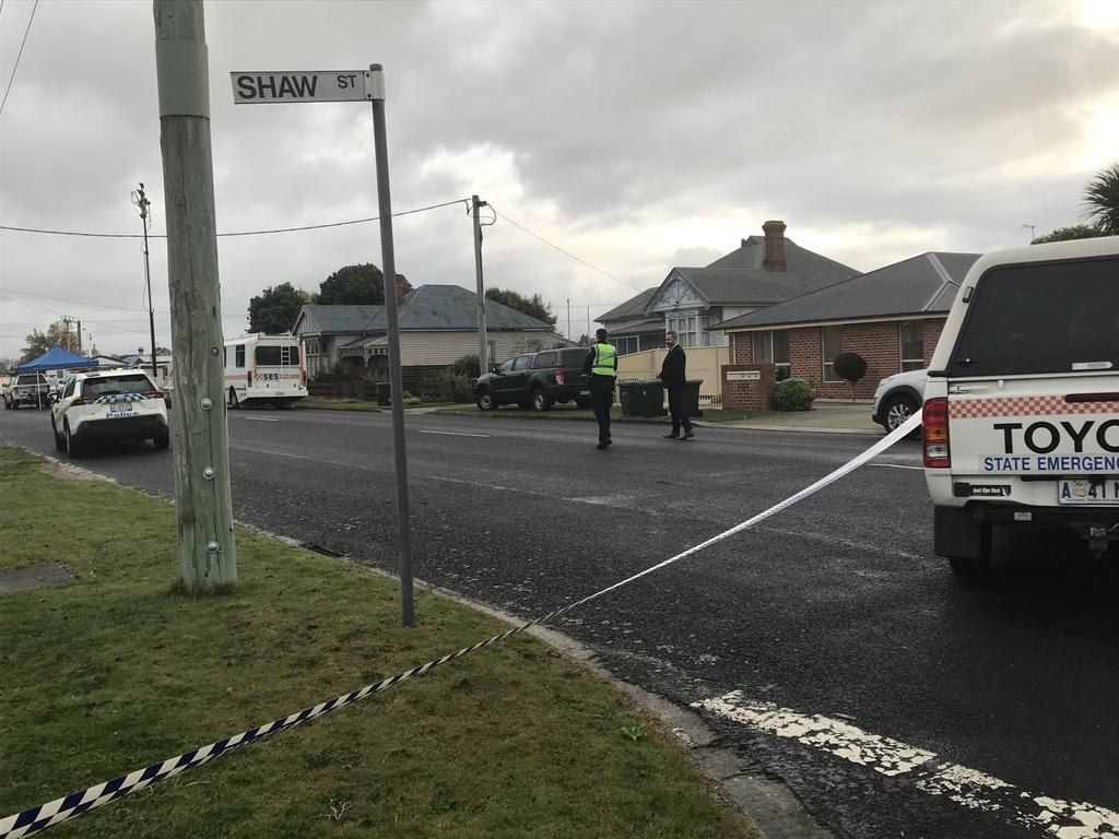 Officers scoured multiple houses for evidence. Photo: Helen Kempton