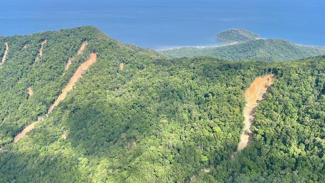 Scarred mountainsides highlight the damage done by Tropical Cyclone Jasper and the floods, Douglas Shire Michael Kerr says.