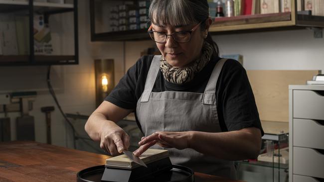 Hiroko Kelly, an expert in knife-sharpening.