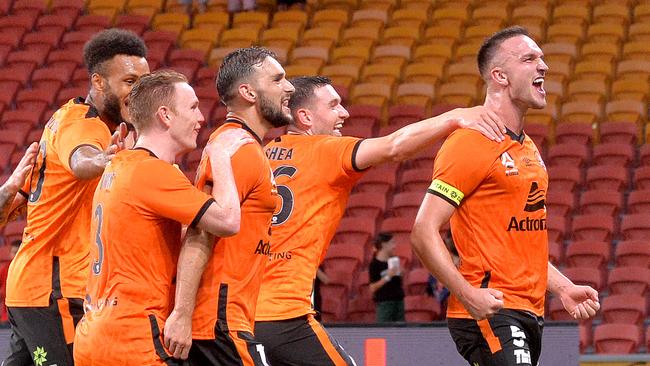 Thomas Aldred is swamped by teammates after scoring against Adelaide United. Picture: Getty Images