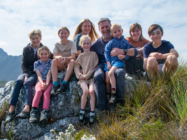 Peter Marmion (centre) with his wife Robyn (far left) and their seven grandchildren. Picture: Claire Marmion