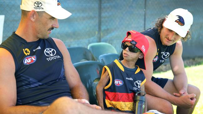 Enzo Cornejo chats with Sam Berry and Taylor Walker. Picture: Dean Martin