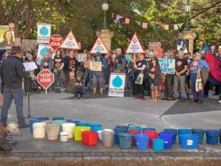 Protesters gathered outside Queensland Parliament calling to 'stop the clock' on approval for Adani's groundwater plan. Picture: HAYLEY TROUPE