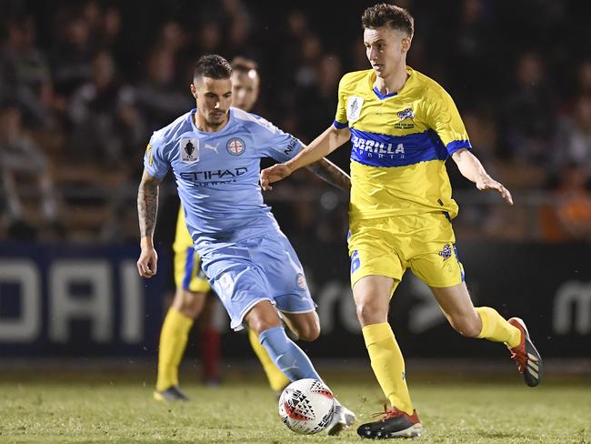 Jamie Maclaren (left) in Melbourne City’s FFA Cup semi-final win over Brisbane Strikers. Picture: Getty Images