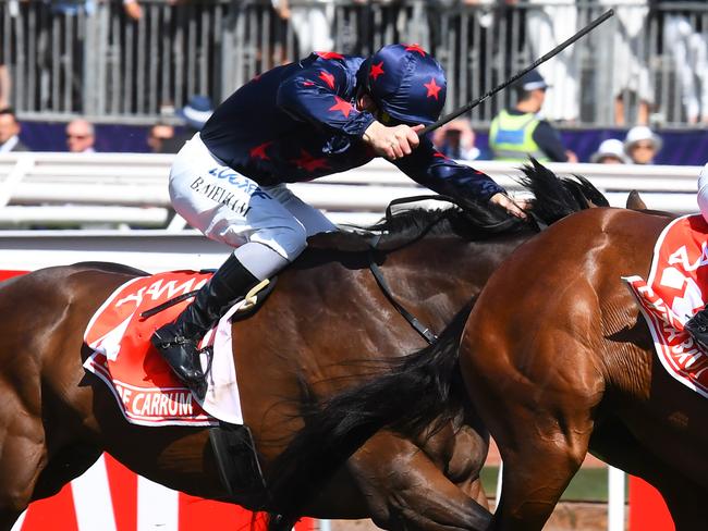 MELBOURNE, AUSTRALIA - NOVEMBER 03:  John Allen riding Extra Brut defeats Ben Melham riding Stars of Carrum in Race 7, AAMI Victoria Derby during Derby Day at Flemington Racecourse on November 3, 2018 in Melbourne, Australia.  (Photo by Vince Caligiuri/Getty Images)