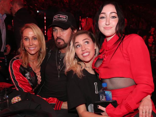 Tish Cyrus with then-husband Billy Ray Cyrus and daughters Miley and Noah in happier times in 2017. Picture: Christopher Polk/Getty Images