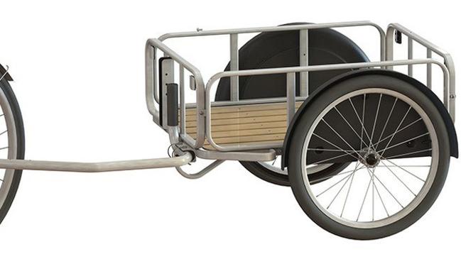 The click system will allow you to add extras to your bike, such as this towing trailer.