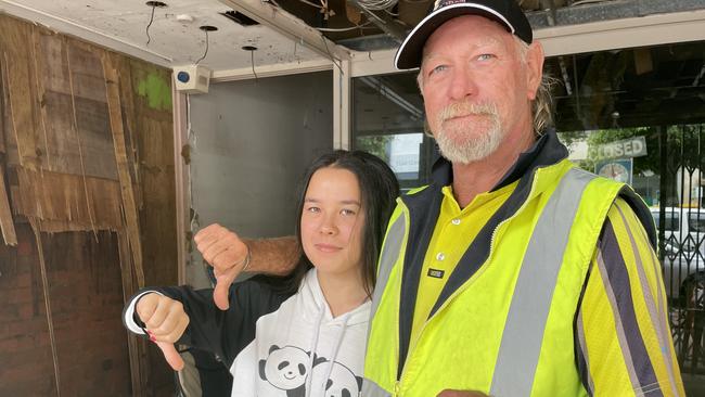 Shane Pruul (R) volunteers at The Penny Man in Lismore and he says the town will never be the same Picture: Nicholas Rupolo.