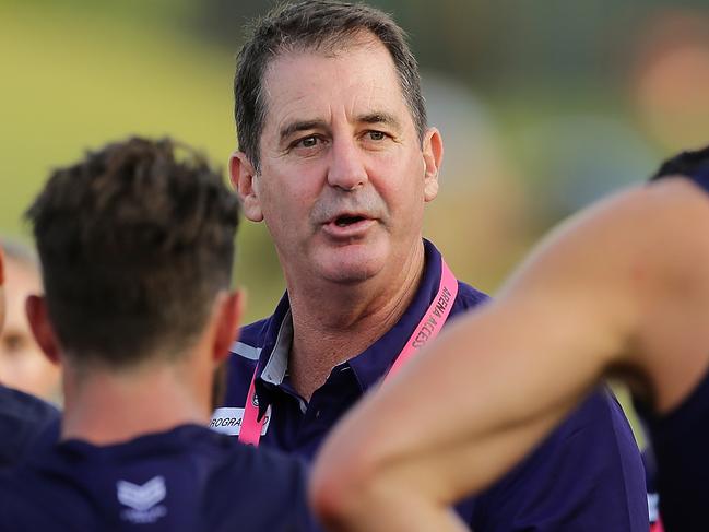 PERTH, AUSTRALIA - MARCH 04: Ross Lyon, Senior Coach of the Dockers, addresses the players at the three quarter time break during the 2019 JLT Community Series AFL match between the Fremantle Dockers and the Collingwood Magpies at HBF Arena on March 04, 2019 in Perth, Australia. (Photo by Will Russell/AFL Media/Getty Images)