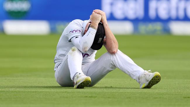 Ben Stokes reacts after dropping a the crucial chance off Lyon. Picture: Getty