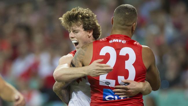 Nick Blakey celebrates with Lance Franklin after kicking a goal in round two of the AFL last season.