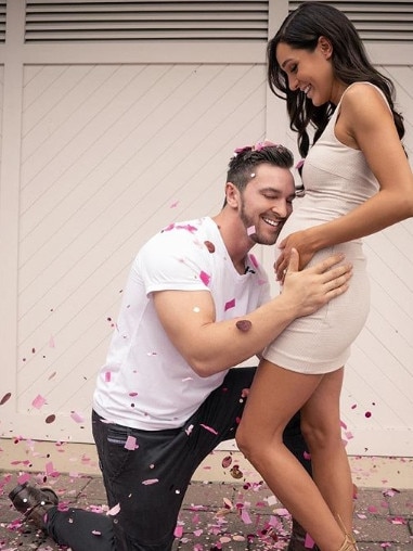 Tobi Pearce and Kayla Itsines when they found out they were having a girl.