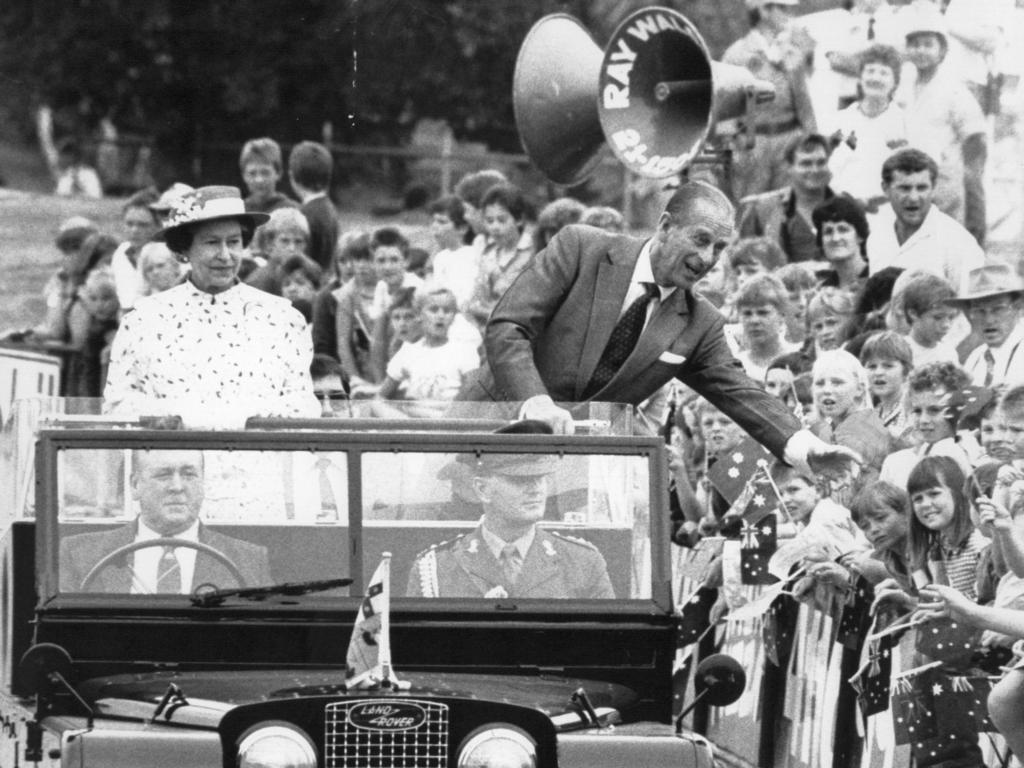 <b>1988 – Albury</b> Prince Philip reaches out to the crowd as he and the Queen are driven past wellwishers at Albury sportsground in New South Wales during the bicentenary tour.