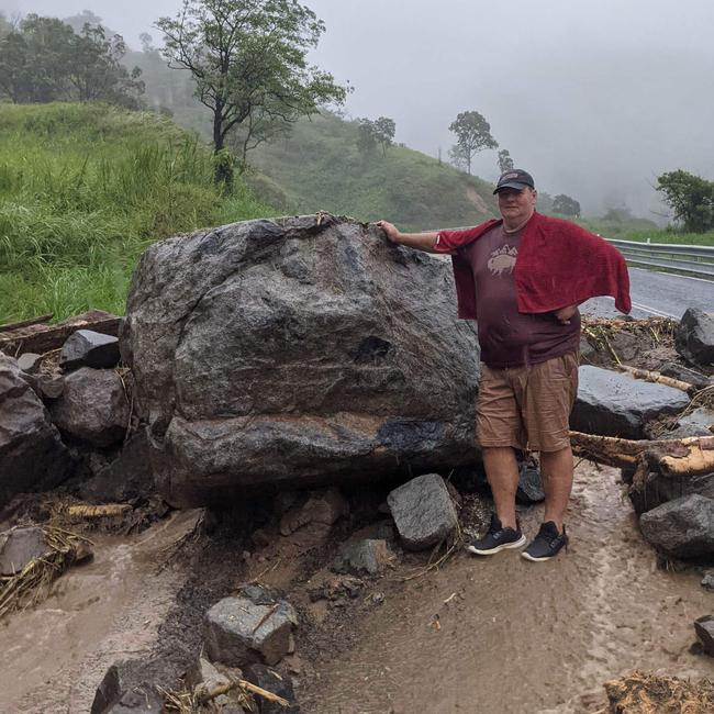 Dairy farmer Dale Fortescue walked up the Eungella range by foot to get back to his cows on Monday afternoon. The Mackay-Eungella road is closed to traffic due to rock and mudslides. Picture: Facebook