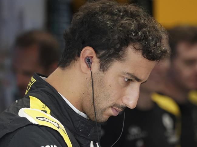 Renault driver Daniel Ricciardo of Australia prepares for the first practice session at the Marina Bay City Circuit ahead of the Singapore Formula One Grand Prix in Singapore, Friday, Sept. 20, 2019. (AP Photo/Vincent Thian)