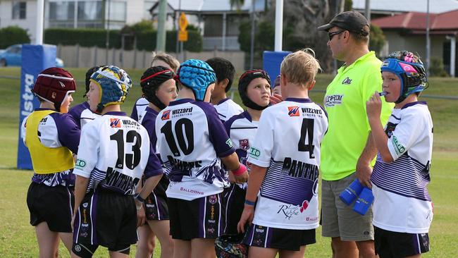 Junior Rugby League at Brothers Leagues Club. Under 10: Springfield Panthers Black vs Fassifern Bombers. Springfield team with their coach in 2017.