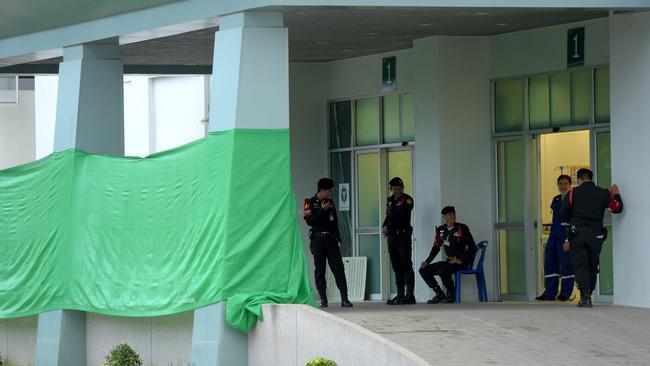 Thai police stand guard in front of the hospital where the boys rescued are being treated. Picture: AFP