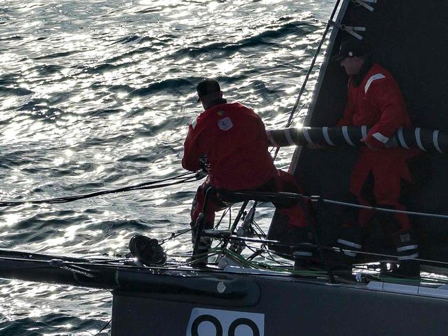 This handout photograph taken on December 28, 2021 and released by Rolex shows yacht SHK Scallywag sailing towards Hobart at the 2021 Sydney to Hobart yacht race. (Photo by Andrea FRANCOLINI / ROLEX / AFP) / --- RESTRICTED TO EDITORIAL USE - MANDATORY CREDIT "AFP PHOTO / ROLEX/ ANDREA FRANCOLINI" - NO MARKETING NO ADVERTISING CAMPAIGNS - DISTRIBUTED AS A SERVICE TO CLIENTS ---