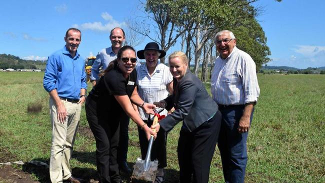 Lismore Chamber of Commerce co-president Sarah Smith and Lismore City Council general manger Shelley Oldham turn the first sod of the $8.2 million flood mitigation project in South Lismore. Picture: Aisling Brennan