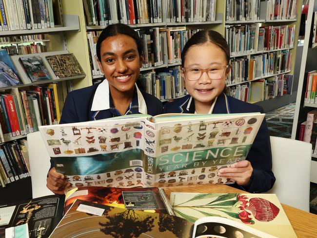 Best Performing Schools by LGA Case Study. Presbyterian Ladies' College (PLC) ranked 5th out of 100 top performing schools in Victoria.  Students Ovindee 16yrs year 10 and Isabella 12yrs year 7 in the library.                      Picture: David Caird