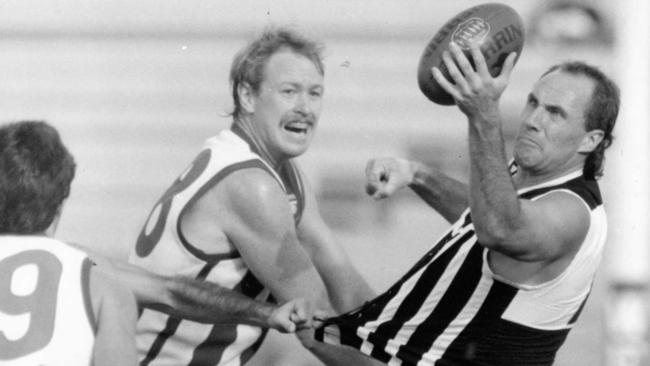 Port Adelaide’s Roger Delaney handballs in 1991. Picture: Ray Titus