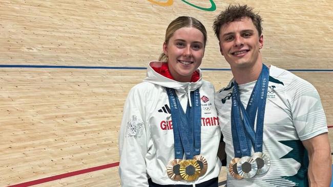 (L-R) British track cyclist Emma Finucane and Australian track cyclist Matt Richardson pose with their medals at the conclusion of the Paris Olympic Games. Richardson will defect to Team GB. The pair are a couple.