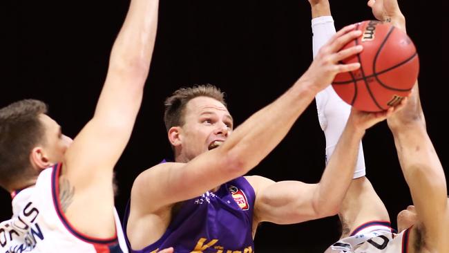 Sydney Kings star Brad Newley gets between two Adelaide 36ers defenders. Picture: Getty Images