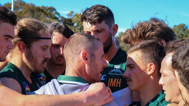 Seaton Ramblers coach Paul Marshall addresses his players. Picture: Brayden Goldspink