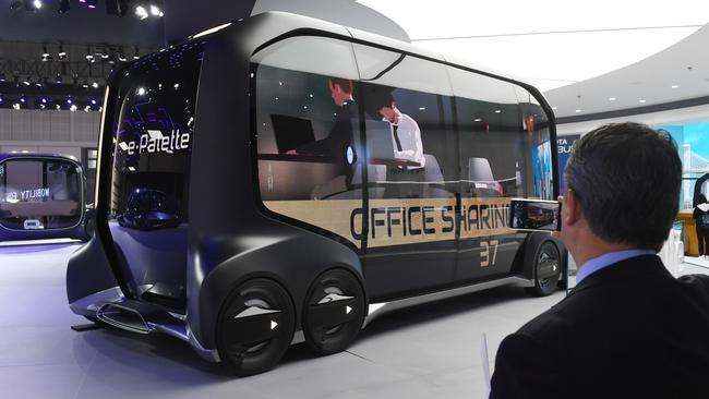 A Toyota e-Palette self-driving concept car at the Shanghai Auto Show in Shanghai this month. A Federal report has warned of the huge changes to come to Australia with more electric and autonomous vehicles. Picture: Greg Baker / AFP