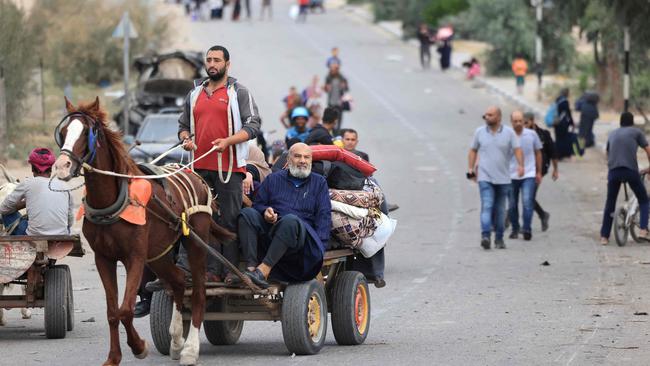 Palestinians arrive south of Gaza City after fleeing their homes. Picture: AFP