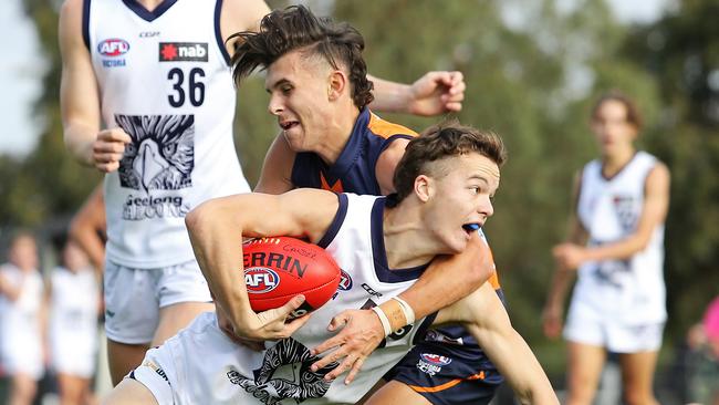 Sam Ramsay lays a tackle against Geelong Falcons.