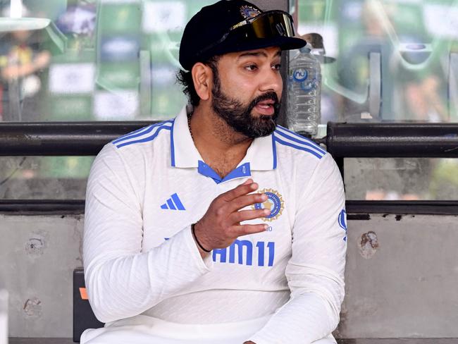 India's captain Rohit Sharma waits for the after-match presentation on on the third day of the second cricket Test match between Australia and India at the Adelaide Oval in Adelaide on December 8, 2024. (Photo by William WEST / AFP) / -- IMAGE RESTRICTED TO EDITORIAL USE - STRICTLY NO COMMERCIAL USE --