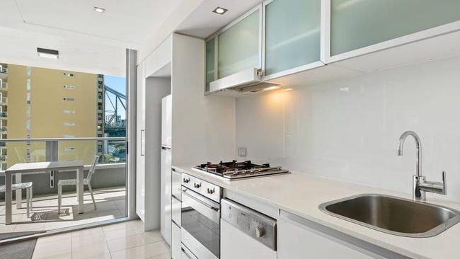 This one bedroom apartment at 55/30 Macrossan St, Brisbane CBD, is on the market as a 'high yield investment opportunity'.